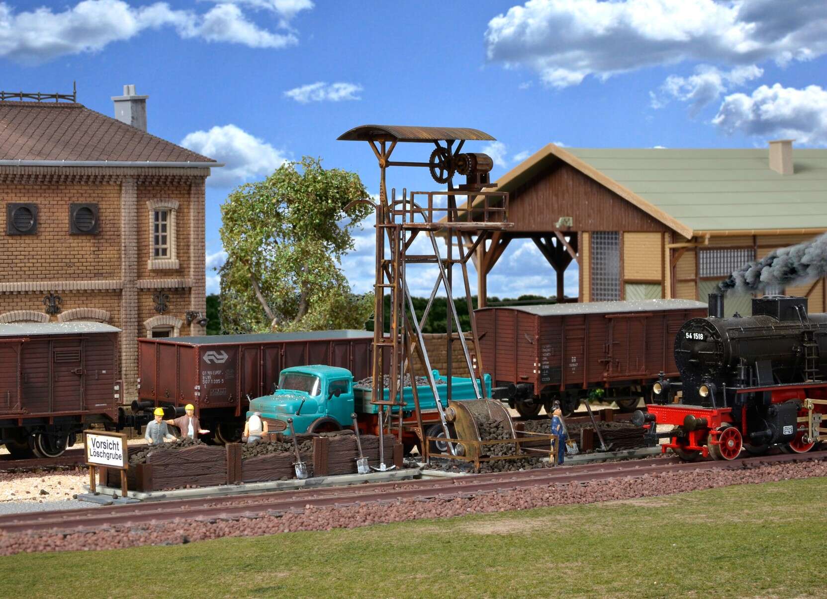 Slag loader with pit