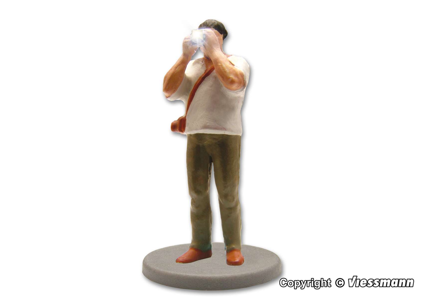 Photographer with equipment and flashlight