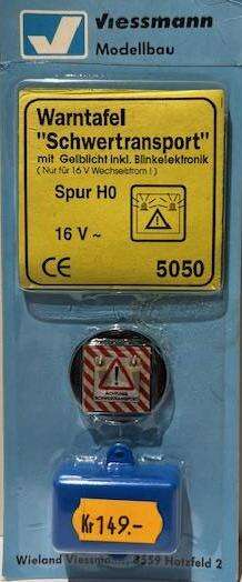 Warning sign "heavy transport" with yellow lights