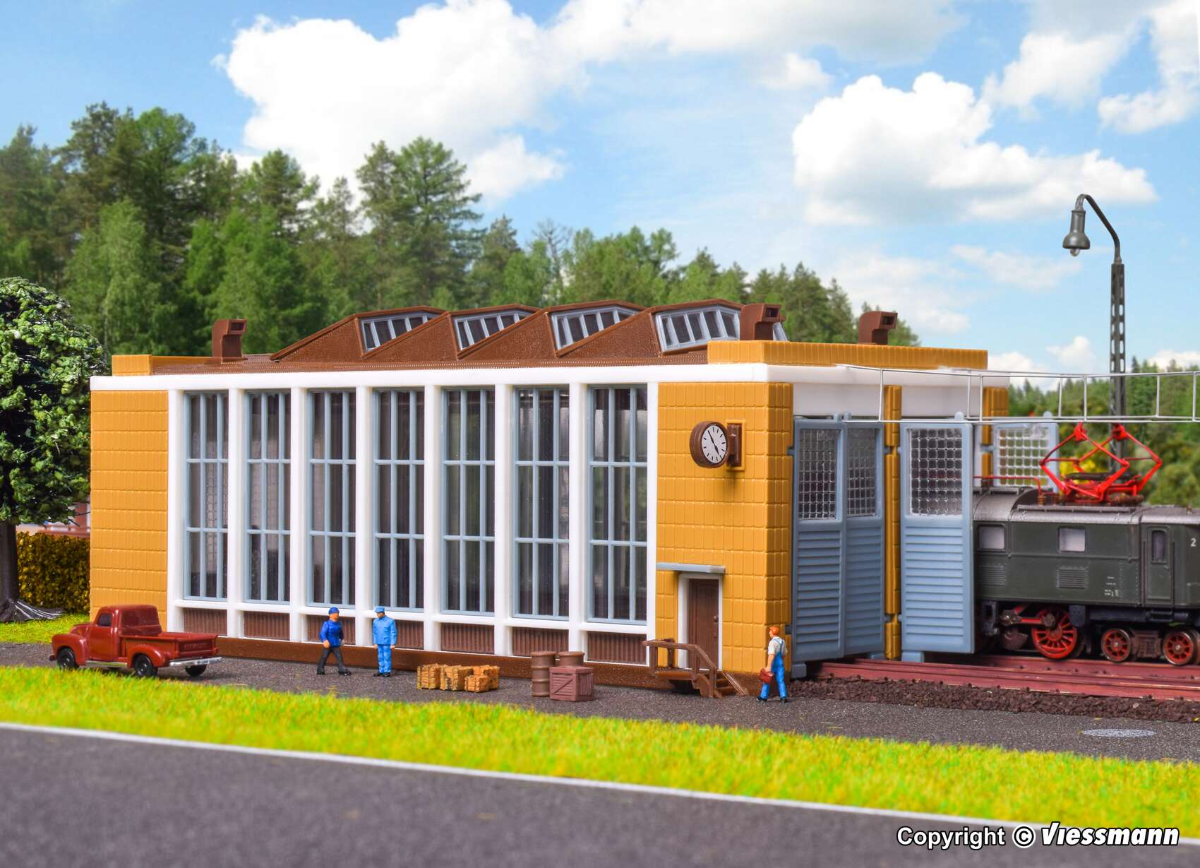 E-loco shed with automatic door lock mechanism, double track