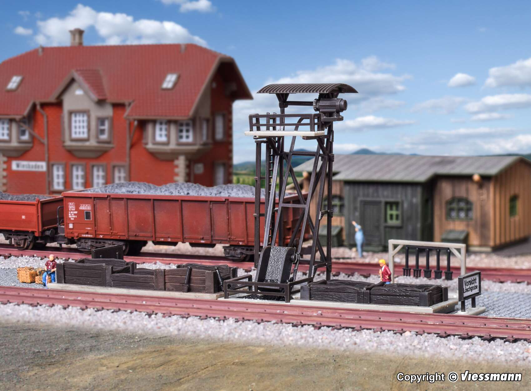 Slag loader with dump