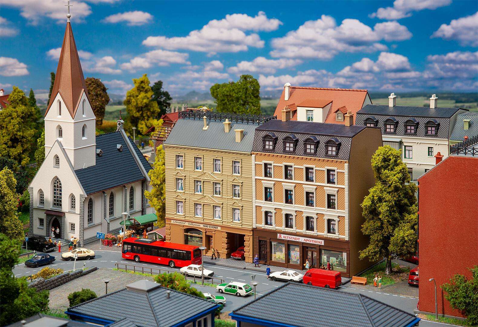 Apartment buildings with pharmacy and delicatessen shop